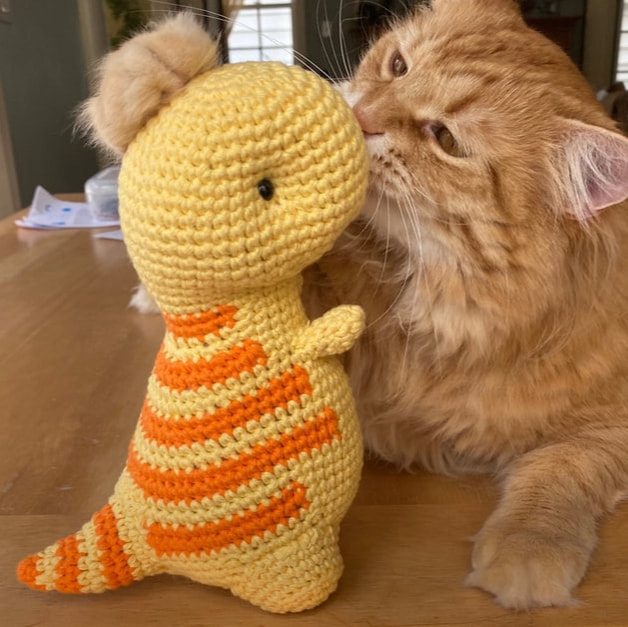 Crocheted T-Rex and Griffin