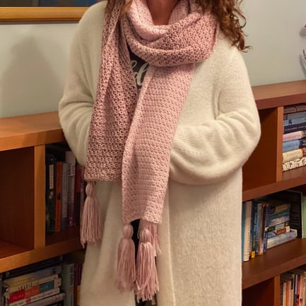 Crocheted pink scarf